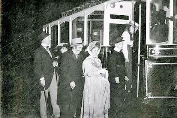 The end of an era - period-costumed passengers board a single-deck car on the final day of trams, 1960 (Y12742)