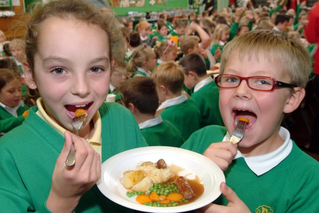 160 pupils at Kirkby's Orchard Primary School, double the usual number of children eating school dinners gathered in 2009 for a Harvest Lunch. Pictured are pupils Abigail Hardy and Alex Lee both eight.