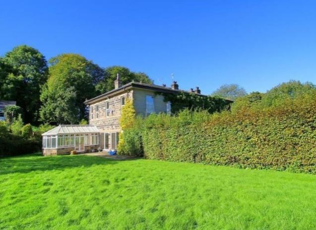 To the rear of the house the property offers additional outbuildings and a garage. To the front of the house there is more off-street parking with enough space for several vehicles and there is also a turning circle.