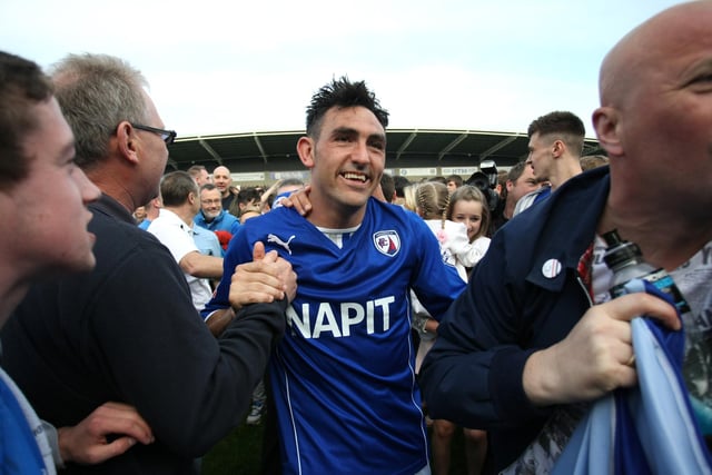 Gary Roberts leaves the field after Chesterfield won the League 2 Championship