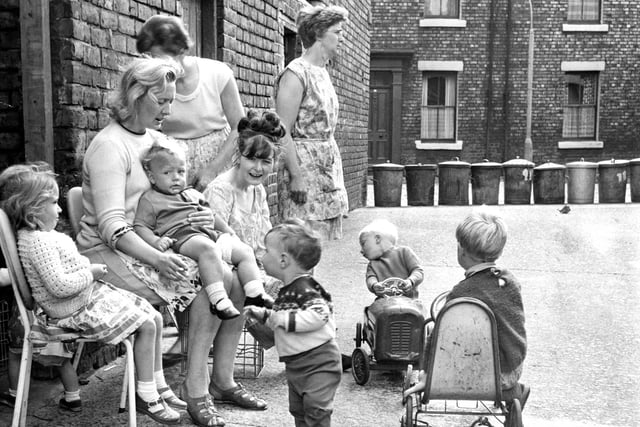 Sitting outside in Byethorne Street in July 1967.
