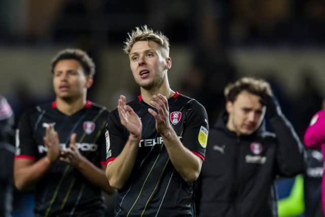 Rotherham United's Jamie Lindsay applauds fans after their draw with Oxford United.
