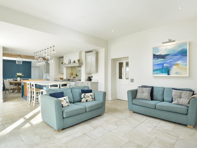 This smart living area leads off the kitchen-dining space