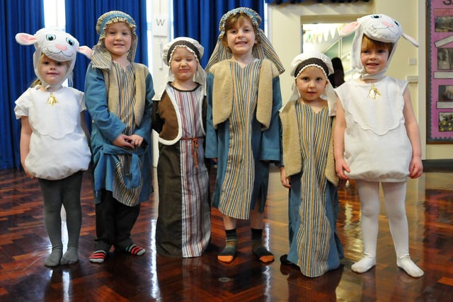Shepherds and sheep from the Fens Primary Nativity play in 2014. Is there someone you know on stage?
