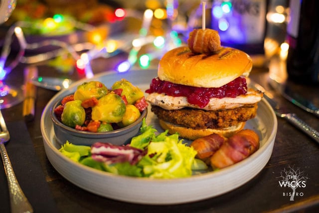 The Wicks, Knowle. Christmas Burger - rosemary marinated chicken with stuffing patty, and cranberry sauce with sprouts, chorizo and pigs in blankets.