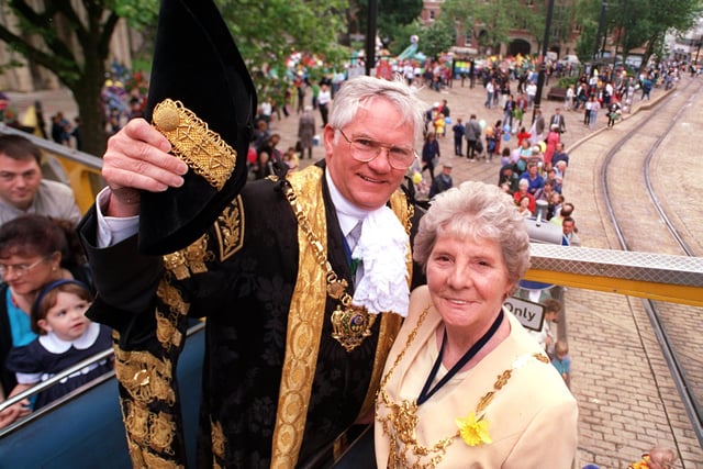 The Lord Mayor & Lady Mayoress of Sheffield Clr Frank & Mrs Freda White watch the Parade pass the Cathedral on board a Open top Bus back in 1998