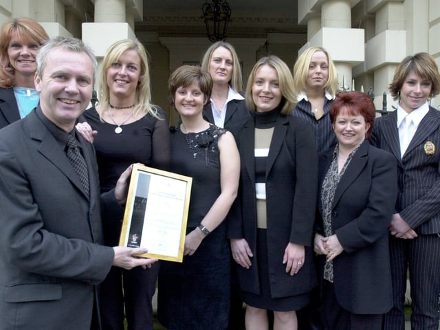 Left, Andrew Collinge presents awards to hairdressers, l/r: Joanne Hinchliffe-Wood, Hilary Sugars, Judith Brown, Clare White, Ruth Langley, Donna Pollitt, Glenys Woods and Nicky Harrod, at the Mansion House, Doncaster in 2001