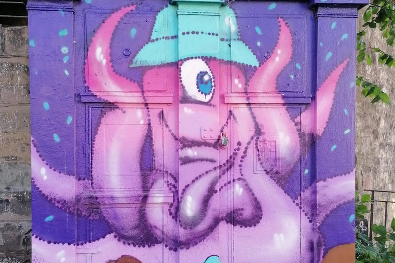 A octopus wearing a hat has transformed this old police box at the foot of Drummond Place