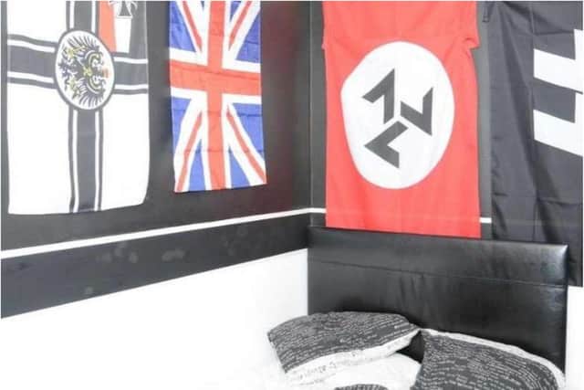 The terrorist's bedroom was decorated with Nazi flags.