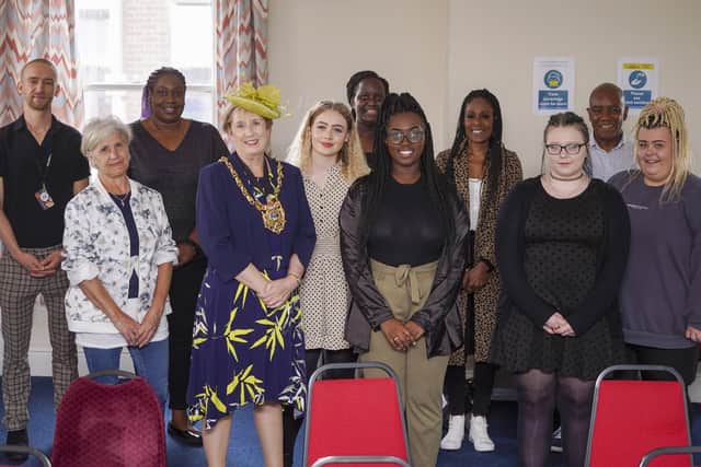 Pictured at SADACCA: the Lord Mayor of Sheffield, Gail Smith; Ursula Myrie, Nigel Wilkes and Marjorie Frater of Adira; Tyrah Myrie of Tyrah's Touch; some of the young women from the Young Women’s Housing Project and support worker, Louise Grubb; Natasha Farrell of Amani kush; and Reece from The Body Shop. Picture Scott Merrylees