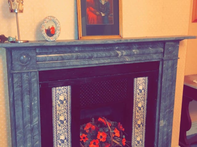 One of the many fireplaces in the 'huge' house.