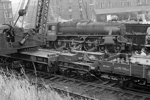 A crane lifts a train derailed at the Dalry Middle junction in August 1963.