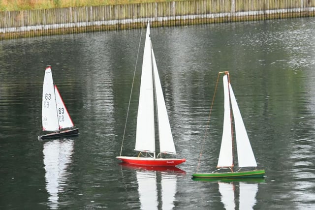 A group of enthusiasts sailing their remote control yachts at Lakeside