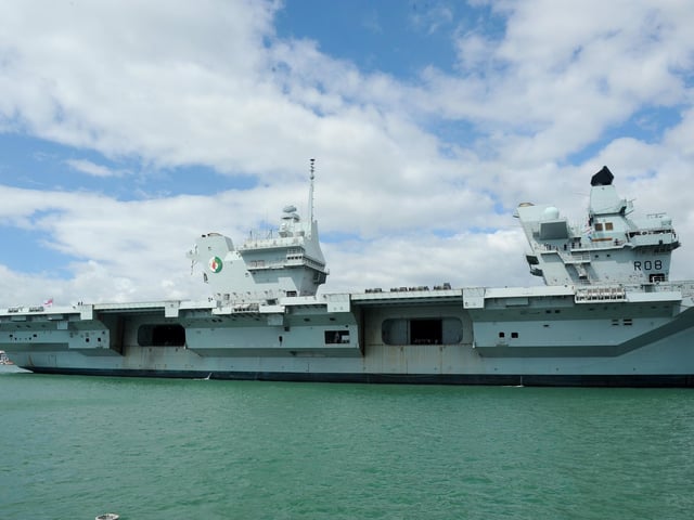 Britain's biggest warship HMS Queen Elizabeth pictured returning to Portsmouth after 10 weeks at sea, carrying out critical training. Picture: (020720-838)