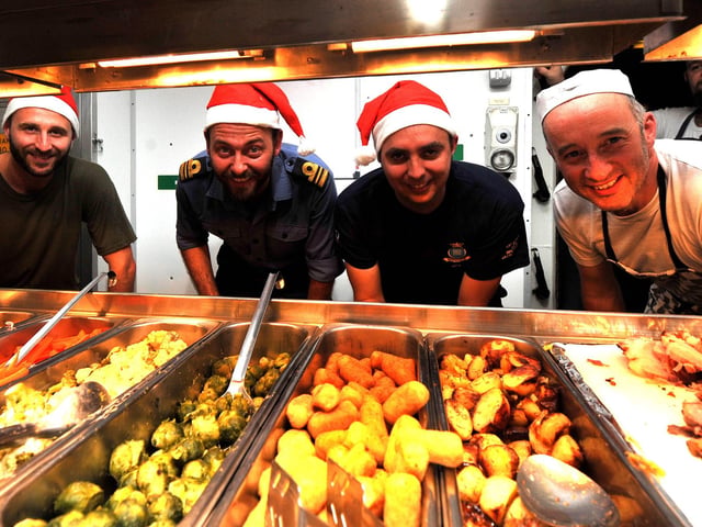 Whilst conducting maritime security patrols in the Indian Ocean, HMS Westminster went festive for the day enjoying a traditional Christmas roast whilst at sea. The Christmas festivities saw all members of the ship's company sit down for a full spread of Christmas grub while at sea. Westminster's commanding officer, Captain Hugh Beard carved a selection of meats on offer, for the rest of the crew.