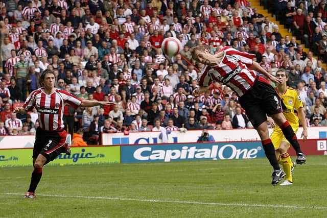 Rob Hulse finds himself unmarked to power home a towering header against Liverpool. (Photo credit: Gareth Copley/PA)