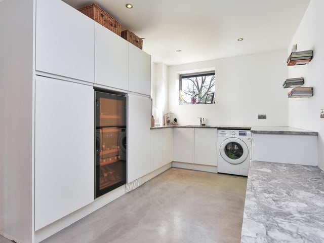 The fitted utility room has internal access to the attached double garage.