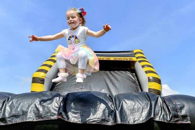 Annabbel Embrey (5) from Carron has fun on the bouncy castle.