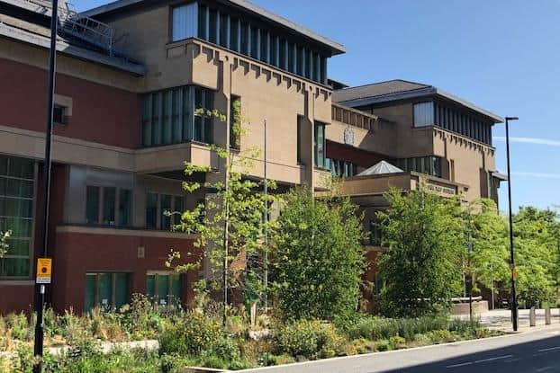 Sheffield Crown Court, pictured, has heard how four men received suspended prison sentences and a woman received a community order after they used threatening behaviour towards a mixed-race family in Sheffield city centre.