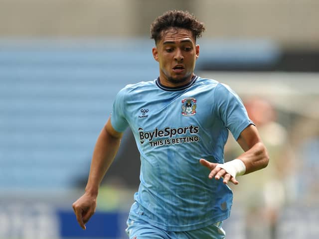 Tyler Walker, son of Sheffield Wednesday legend Des, has signed for the Owls' League One rivals Portsmouth.
