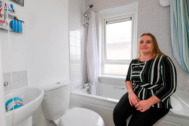 Eventually a saturated ceiling collapsed at 3am and in desperation Rebecca contacted The Star. Now, after five weeks of work, she has a gleaming new bathroom.
