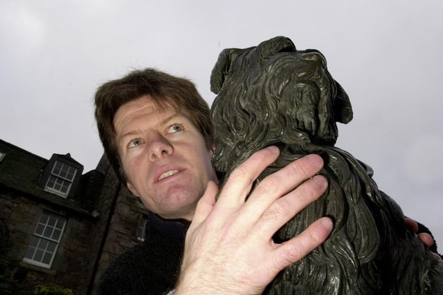 In 2001 shop owner Matthew Hale, pictured beside the statue, started a fan club dedicated to the little dog.