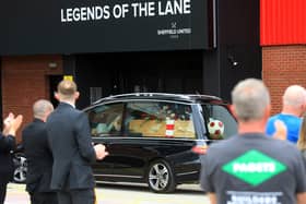 The funeral of former Sheffield United captain Len Badger passes Bramall Lane.  Picture: Chris Etchells