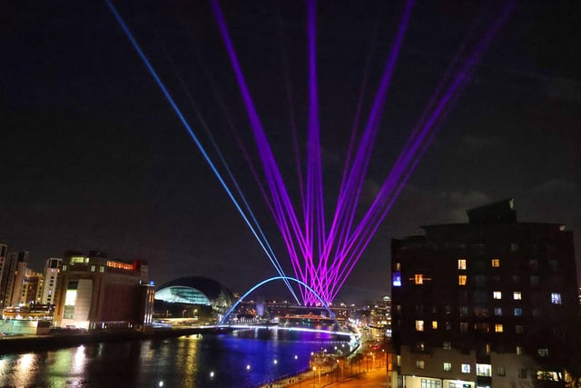 The high-powered lasers can be seen from a number of locations across the city.