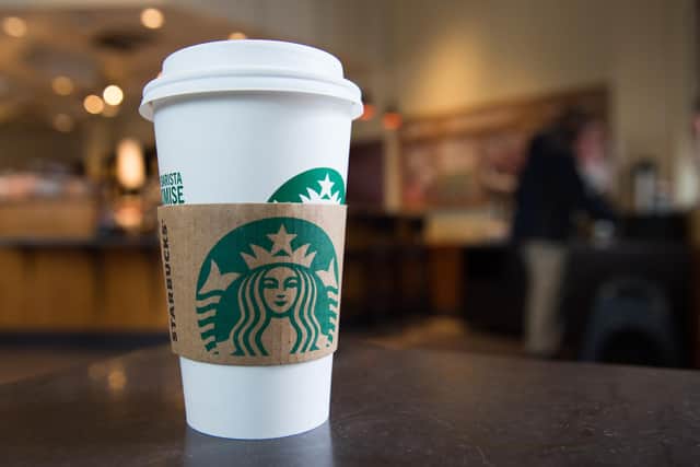 A Starbucks coffee cup. (Photo: SAUL LOEB/AFP via Getty Images)
