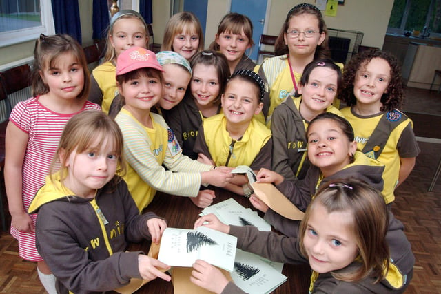 Members of the 14th Mansfield St. Augustines Brownies get stuck into their mailing duties with the Tree of Light leaflets back in 2008