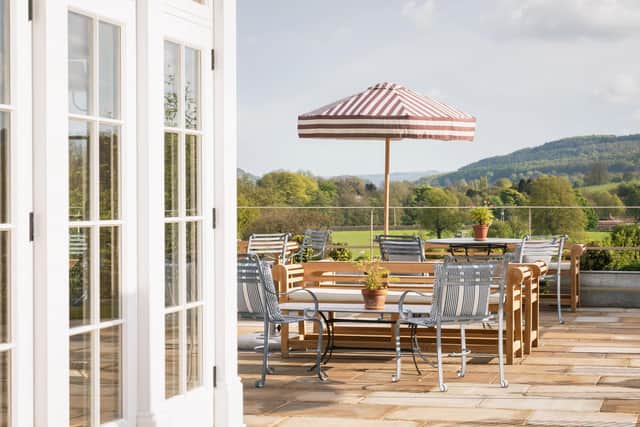 Looking out onto the terrace from The Cavendish's new Garden Room. Image: Devonshire Hotels