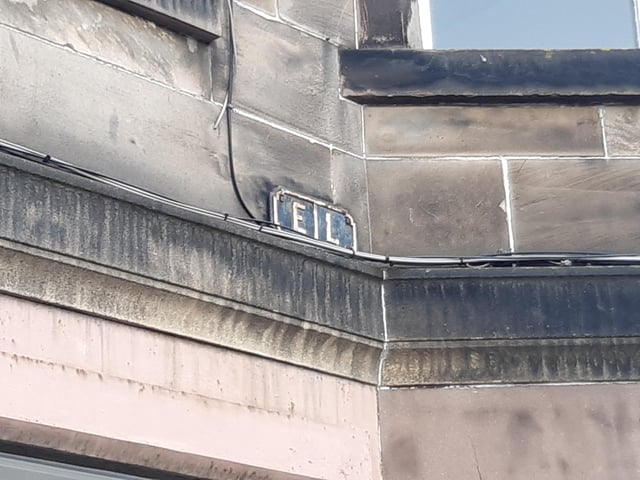 The old boundary between Edinburgh and Leith was well-defined and we can still see evidence of this on many buildings. This plaque, fixed to a tenement frontage in Albion Road, bears the letters E and L to mark the frontier betwixt the two burghs.