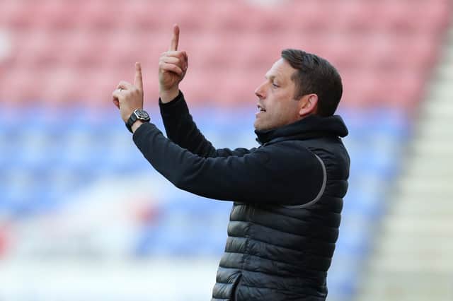 WIGAN, ENGLAND - APRIL 13: Leam Richardson, Interim Manager of Wigan Athletic reacts during the Sky Bet League One match between Wigan Athletic and Sunderland at DW Stadium on April 13, 2021 in Wigan, England. (Photo by Lewis Storey/Getty Images)