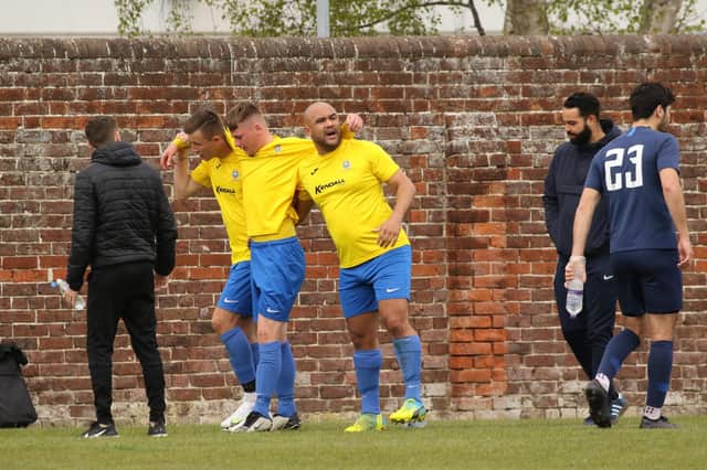Milton Rovers players come together to celebrate a goal in their 3-0 City of Portsmouth Sunday League Division 1 win at North End Cosmos. Picture: Kevin Shipp