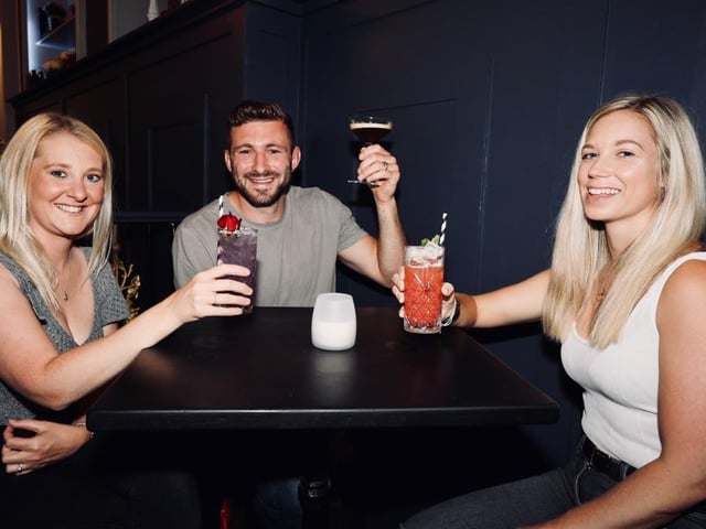 Pubs reopened on Saturday, July 4 - (l to r) Katie and Liam Perkins, and Alice Hosker, drinking in the Monarch.  Picture: Chris Moorhouse