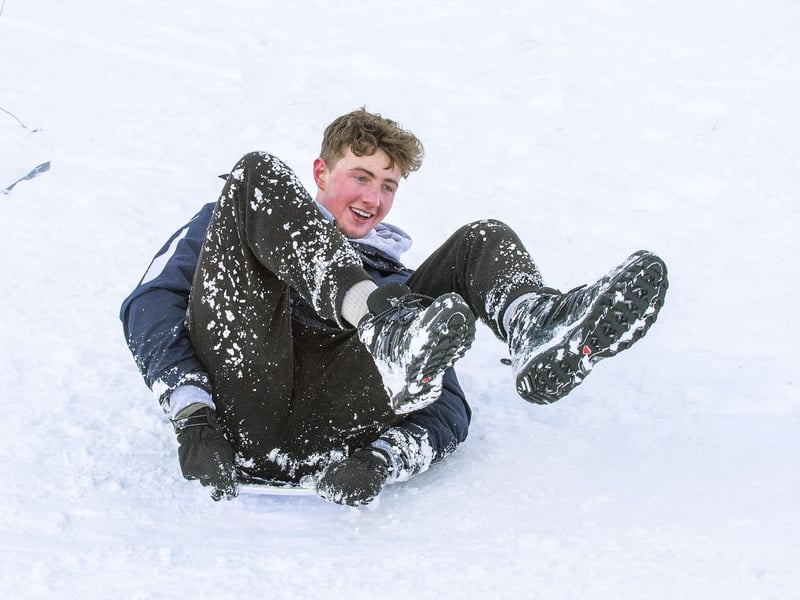 One local makes a highly dignified descent of Arthur's Seat.