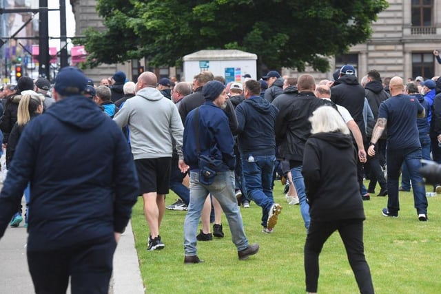 A group of those looking to see the statue removed were being escorted down North Hanover Street in the city when they overtook the police escort and began running towards George Square.