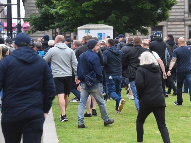 A group of those looking to see the statue removed were being escorted down North Hanover Street in the city when they overtook the police escort and began running towards George Square.