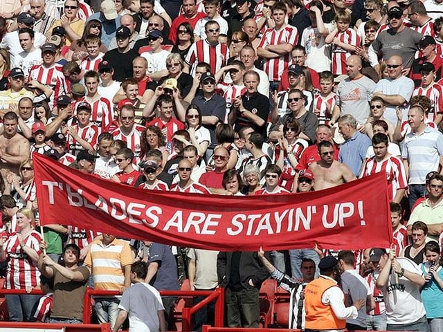Blades fans with banners show their feelings at the Sheffield United v West Ham United match on April 5, 2007