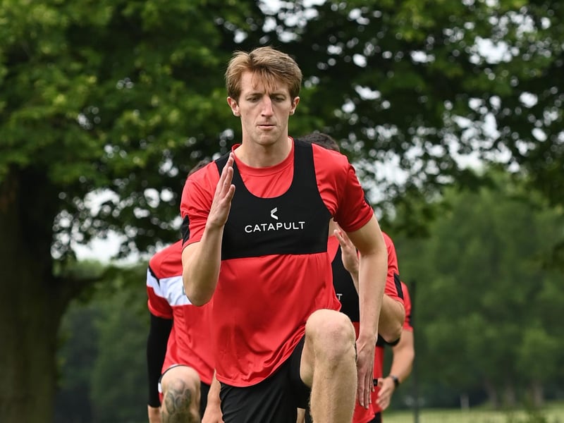 Tom Anderson leads the line in a fitness drill