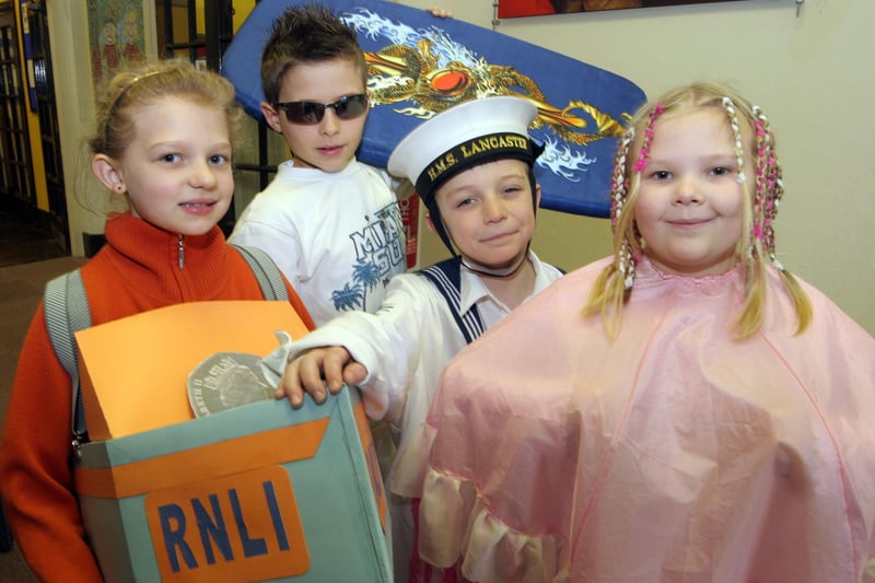 Emilie Palmer, Tom Scott, Callum Smith and Rebecca Hardy celebrate RNLI day at Highfield hall primary school.