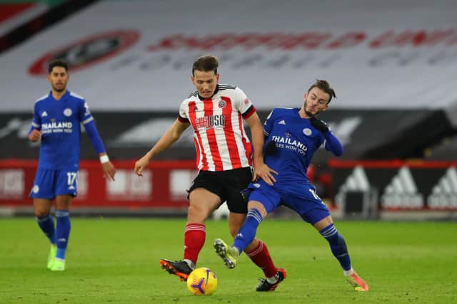 Sander Berge of Sheffield Utd tussles with James Maddison of Leicester City during the Premier League match at Bramall Lane, Sheffield. Picture date: 6th December 2020. Picture credit should read: Simon Bellis/Sportimage