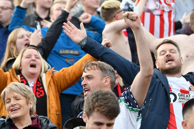 Sunderland fans cheering on their team against Gillingham.