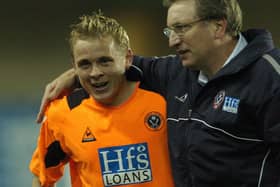 Neil Warnock congratulates Derek Geary on his goal against Millwall