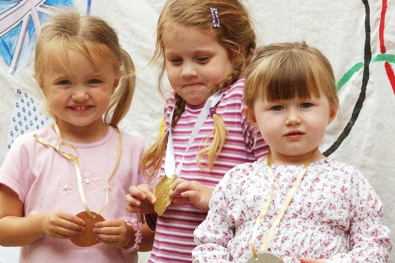 Bless! It's an Olympics day at the Little People Day Nursery in 2004 and they even had their own medals. Remember this?