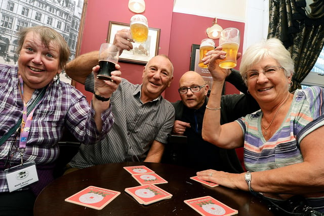 Sheffield Real Ale Tours launched a tour of real ale pubs. Our picture shows tour director, Maire McCarthy (left), with tour members from left, Roger Bows, of Stocksbridge, Keith Ripley, of Barnsley, and Wendy Bows, of Stocksbridge, having a drink in the Three Tuns pub, September 2013