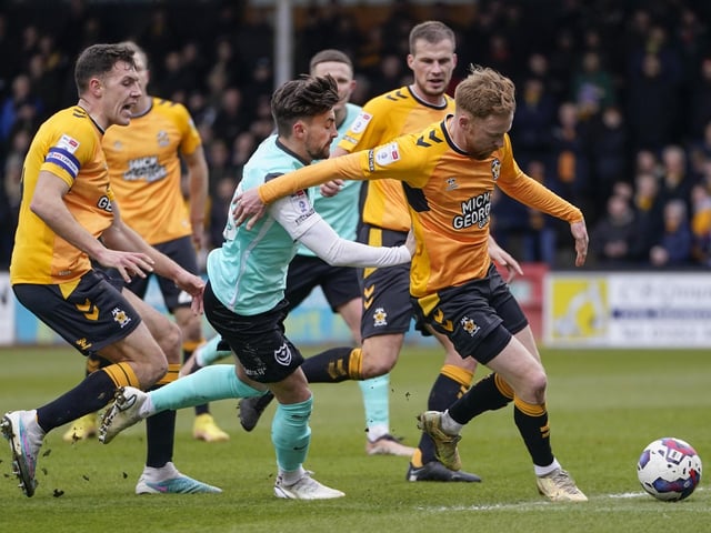 Owen Dale is surrounded by Cambridge players. Picture: Jason Brown/ProSportsImages
