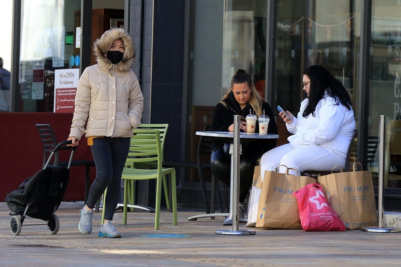 Shoppers enjoying a sit down outside on The Moor, Sheffield as non-essential stores closed during the third lockdown in England reopened on Monday, April 12