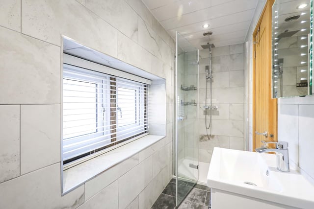 With a walk-in shower, this bathroom looks well-equipped for a family