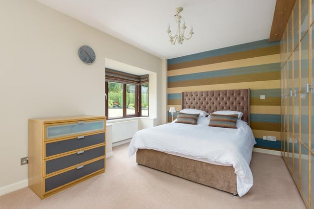 One of the two downstairs properties, this bedroom looks out onto the large garden and, like every other bedroom, has it's own en-suite.